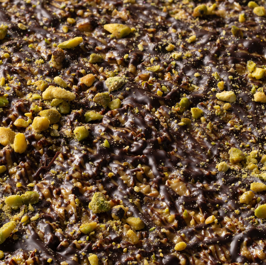 Belgian Chocolate Slab with crispy Katafi and pistachio cream topped with crushed pistachio